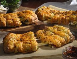 Domino's Pizza Launches New Stuffed Cheesy Bread Line Domino's Pizza Launches New Stuffed Cheesy Bread Line