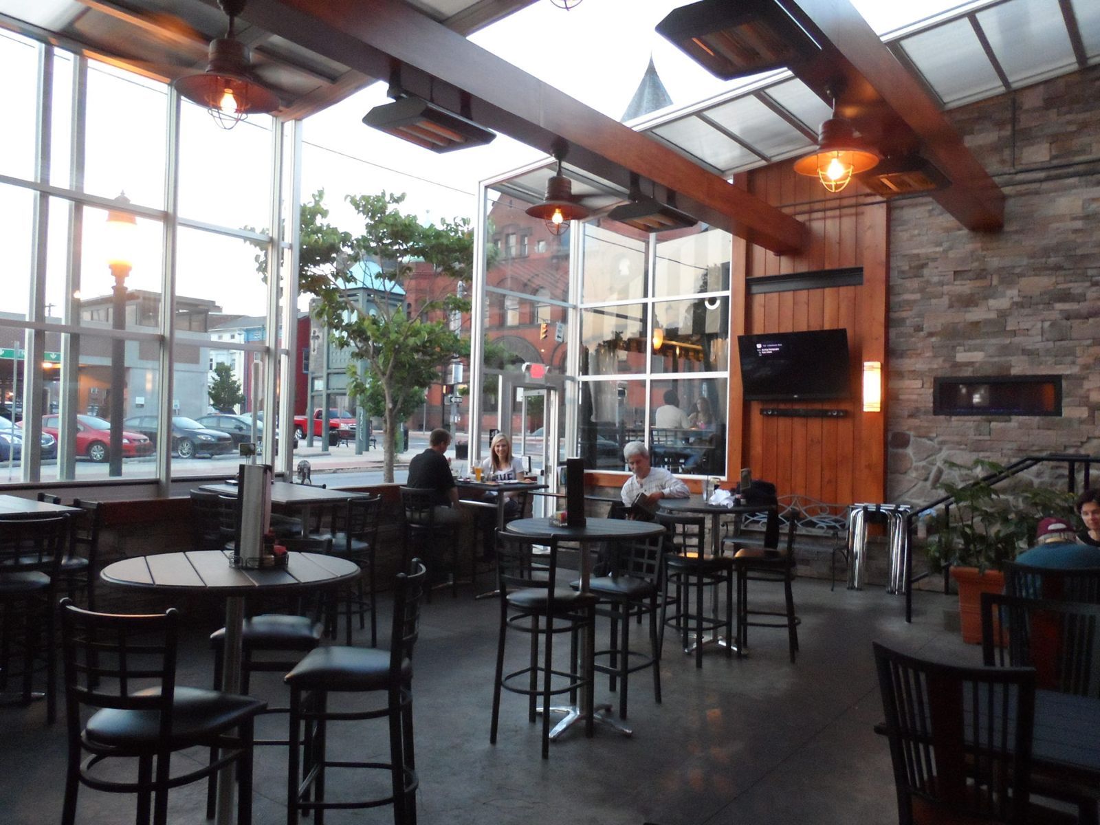 Maximize Your Restaurant's Revenue with a Retractable Patio Enclosure by Roll-A-Cover