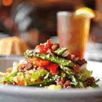 BRIO's new Insalata Roma. Tricolore with candied pecans, grapes, Gorgonzola, tomatoes, grilled asparagus, roasted red peppers and a zesty balsamic vinaigrette. BRIO's new Insalata Roma. Tricolore with candied pecans, grapes, Gorgonzola, tomatoes, grilled asparagus, roasted red peppers and a zesty balsamic vinaigrette.