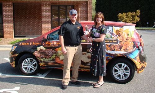 East Coast Wings & Grill Awards 'Keys to Excellence' to Franchise Owner with a New Car East Coast Wings & Grill Awards 'Keys to Excellence' to Franchise Owner with a New Car