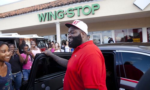 Rick Ross Heats Up Wingstop Restaurant in Miami Rick Ross Heats Up Wingstop Restaurant in Miami