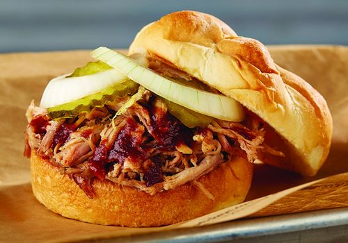 Roland Dickey Stops by New Dickey's Barbecue Pit in Seaside
