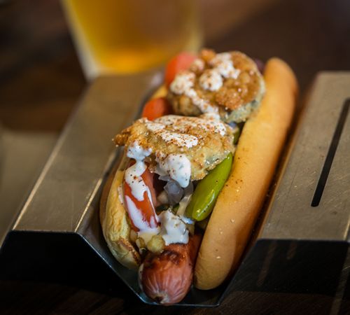 JJ's Red Hots Helps 1060 Creative Celebrate its 10th Anniversary with a World-Class Hot Dog Named in its Honor