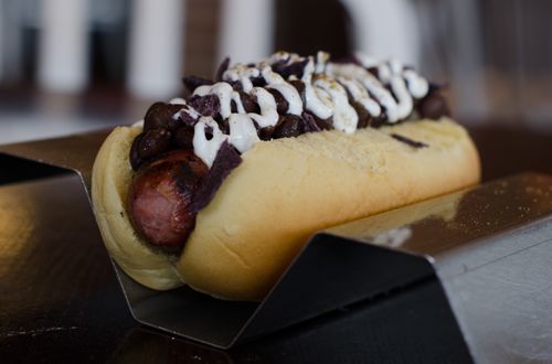 JJ's Red Hots Creates a "Keep Hounding" Dog as Carolina Prepares to Keep Pounding! In The Big Game