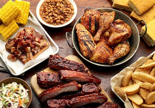 Famous Dave's Signs Area Development Agreement for Charlotte, North Carolina