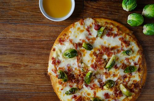 PizzaRev Unveils New Maple-Roasted Brussels Sprouts & Bacon Pizza