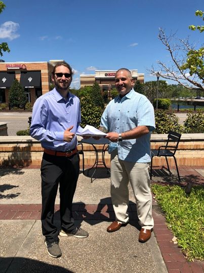 Pictured: Geoff Decker (left) with Sal Rincione, CEO of Crave (right).