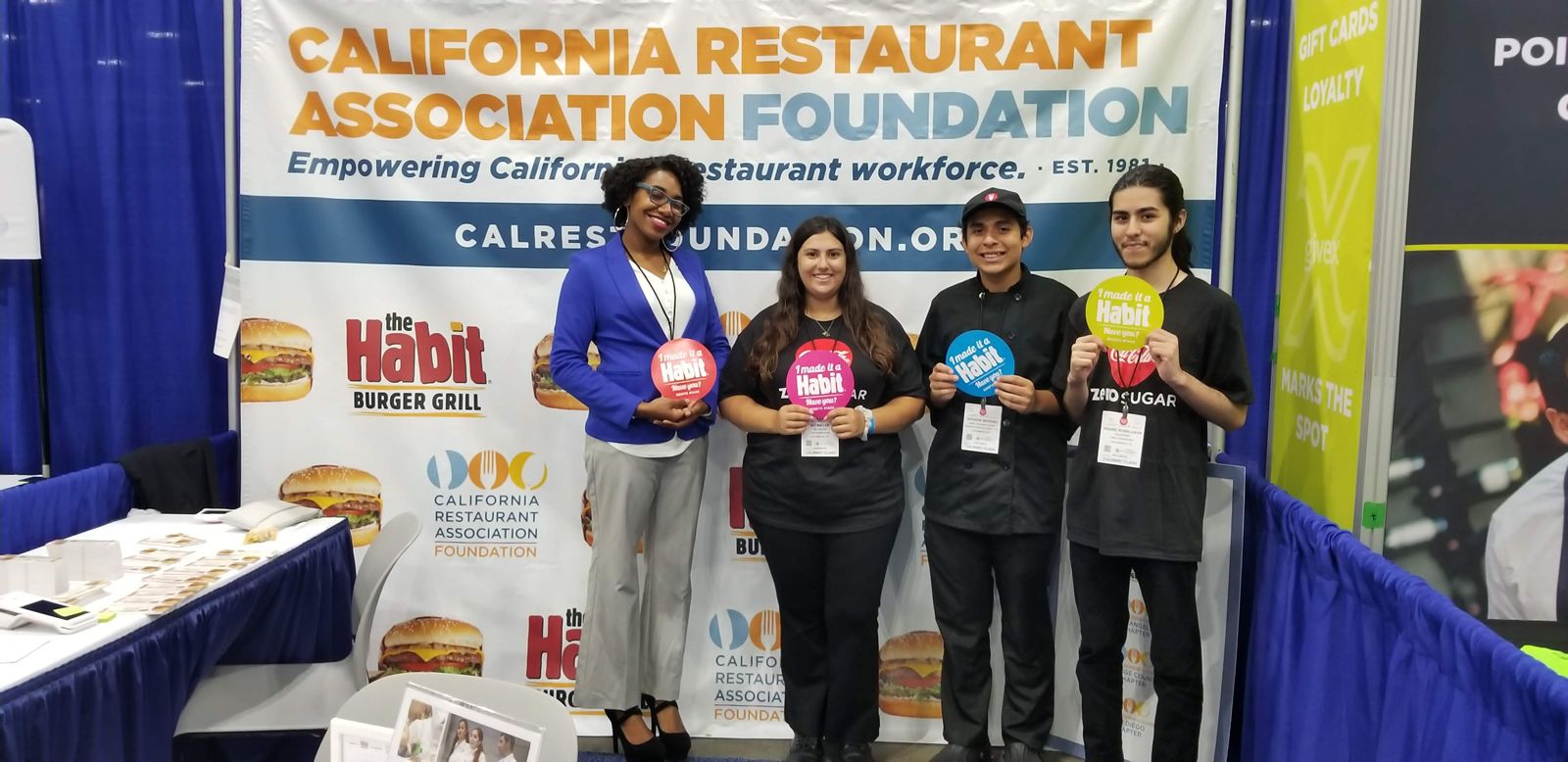 ProStart alumni volunteers at the 2018 “Make It A Habit” booth: Orlanda De’Paz, Ali Mlilar, Andrew Moreno, Chris Angelo Marinas