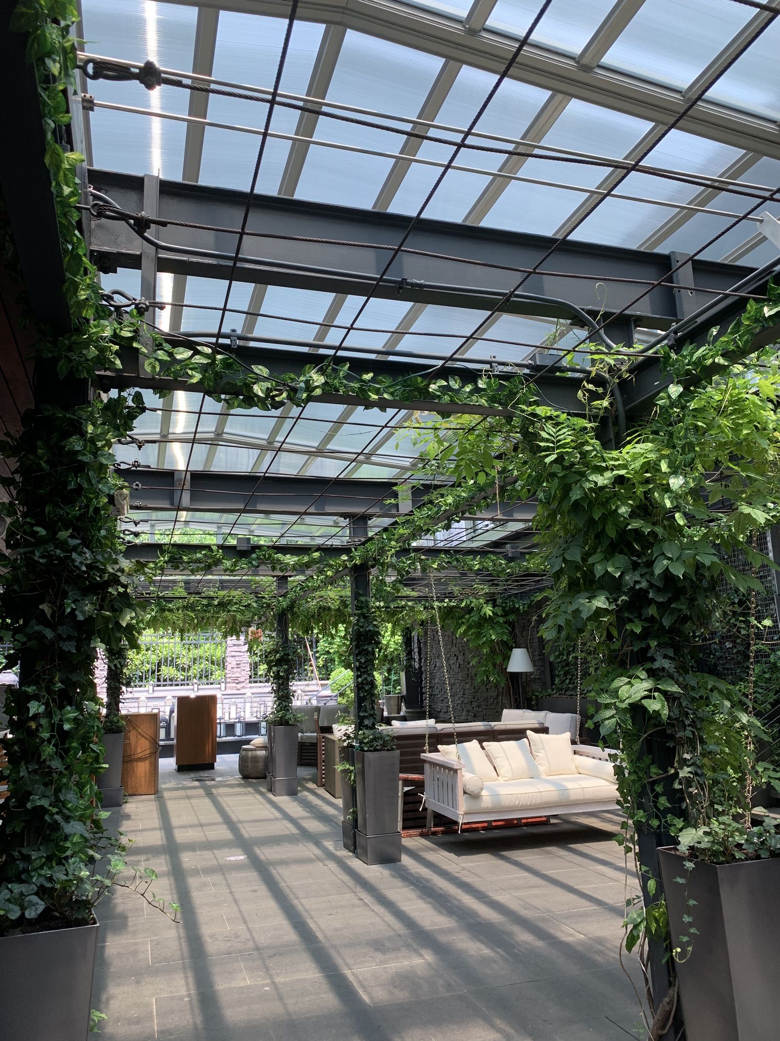 J House Greenwich Features Motorized Roof by Roll-A-Cover