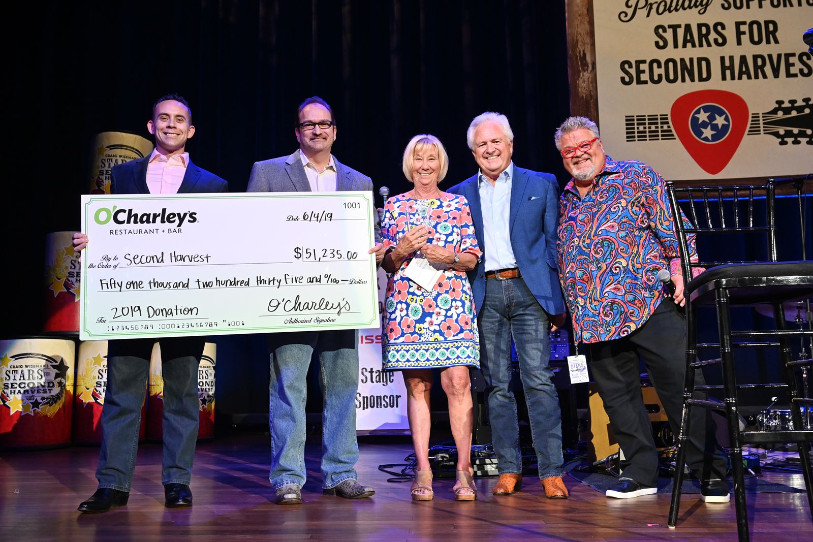 Pictured: O'Charley's Regional Vice President Ian Geralds, O'Charley's Senior Vice President of Operations Chuck Westphal, Second Harvest President & CEO Jaynee Day, O'Charley's Chief Concept Officer of Family Dining Bob Langford and Craig Wiseman.