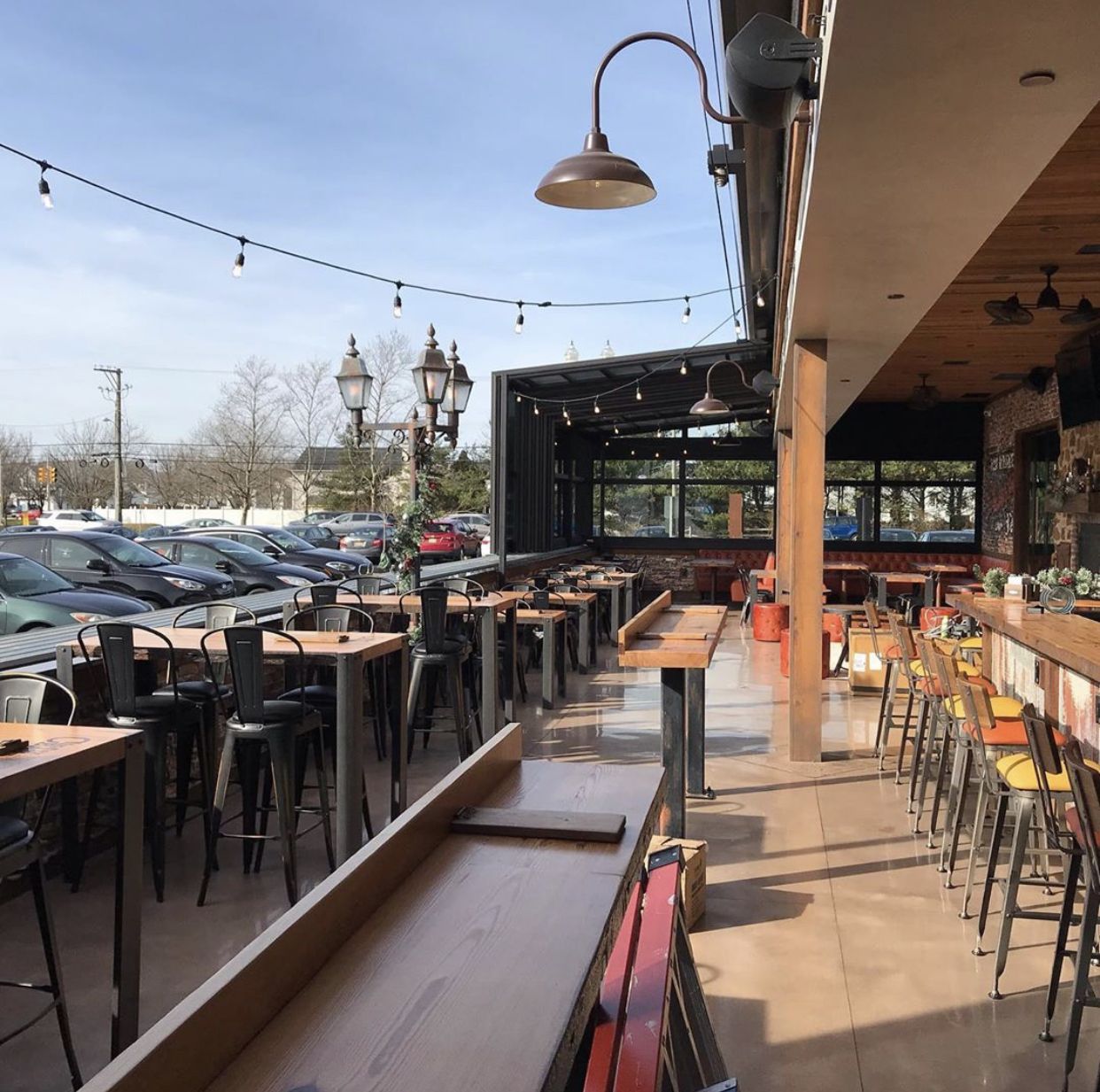 Cinder Bar's Roll-A-Cover Retractable Patio Enclosure Opening Soon