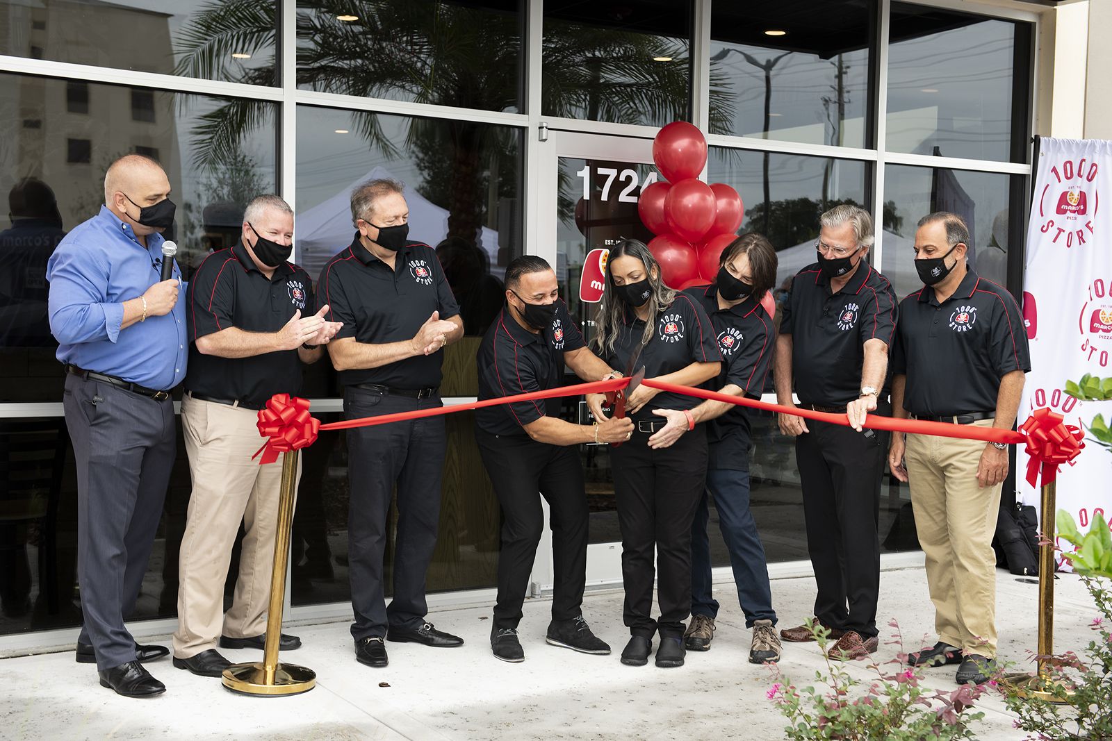 Marco's Pizza Opens Its Milestone 1,000th Store, Charting an Incredible Growth Journey Marco's Pizza franchisees Rafi Vargas, Kattya Barbaran, and Ed Boyer (all holding scissors, center) cut a Grand Opening ribbon at the brand's 1,000th store in Kissimmee, Fla. on Wednesday, Oct. 21, 2020. The three are residents of Kissimmee. Flanking them, from left, are Tony Libardi, Marco's President and COO, Mike Fletcher, Marco's Area Representative, founder Pasquale Giammarco, Marco's Pizza CEO Jack Butorac, and Glenn Ajmo, Marco's Pizza Area Representative.